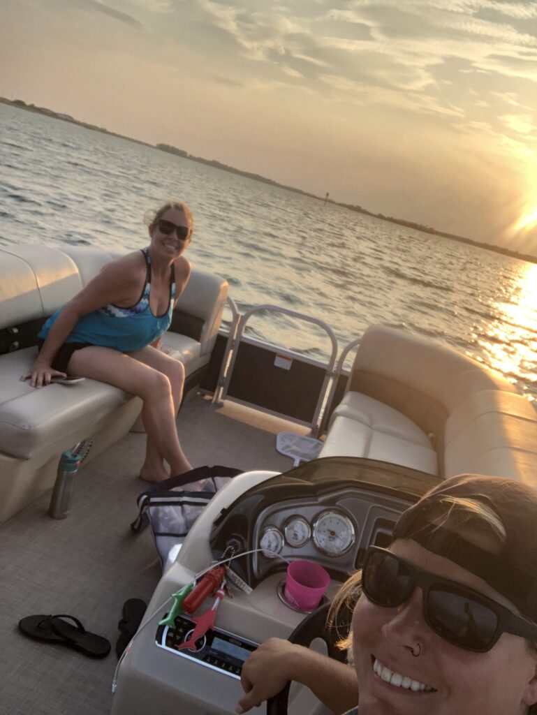 Sunset view from a boat during a dolphin cruise near Destin Harbor on the Emerald Coast