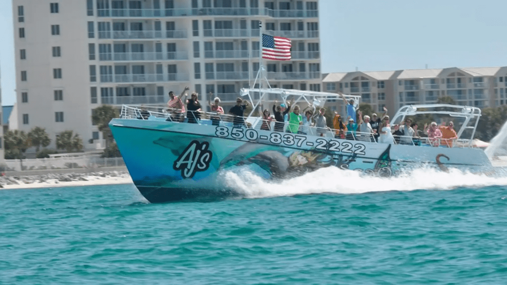 Dolphin cruise boat carrying visitors along the Destin and Okaloosa Island coastline on Florida’s Emerald Coast