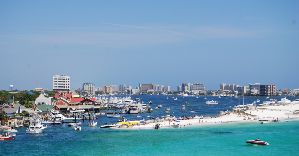 Aerial view of Destin Florida showing emerald water, white sand beaches, and the Emerald Coast shoreline