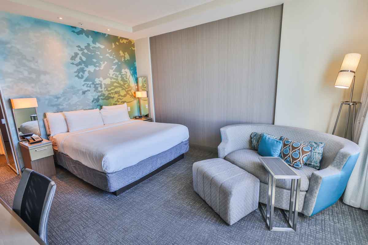 Sundrift Inn oceanfront king room in Fort Walton Beach Florida with seating area and modern decor