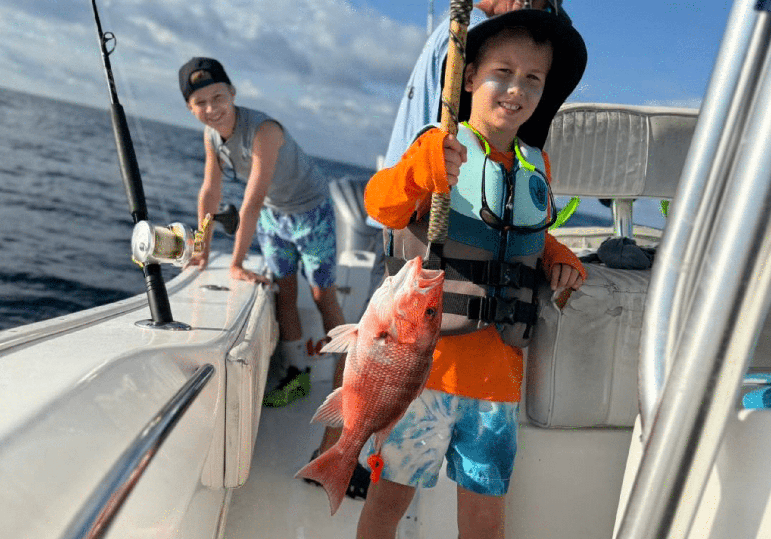 Family fishing and outdoor adventure on a boat in Destin Florida