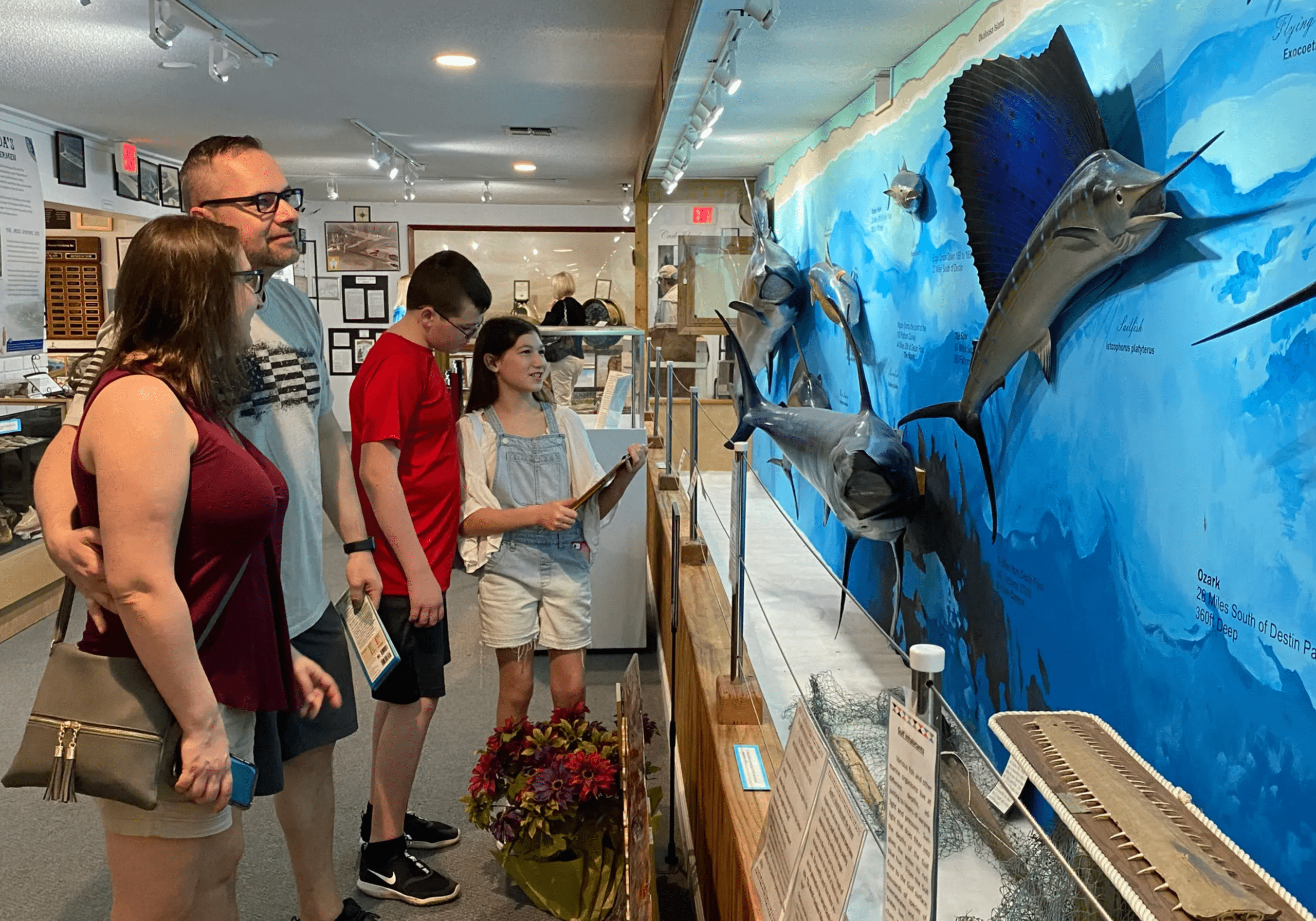 visitors viewing exhibits at Destin History and Fishing Museum in Destin Florida