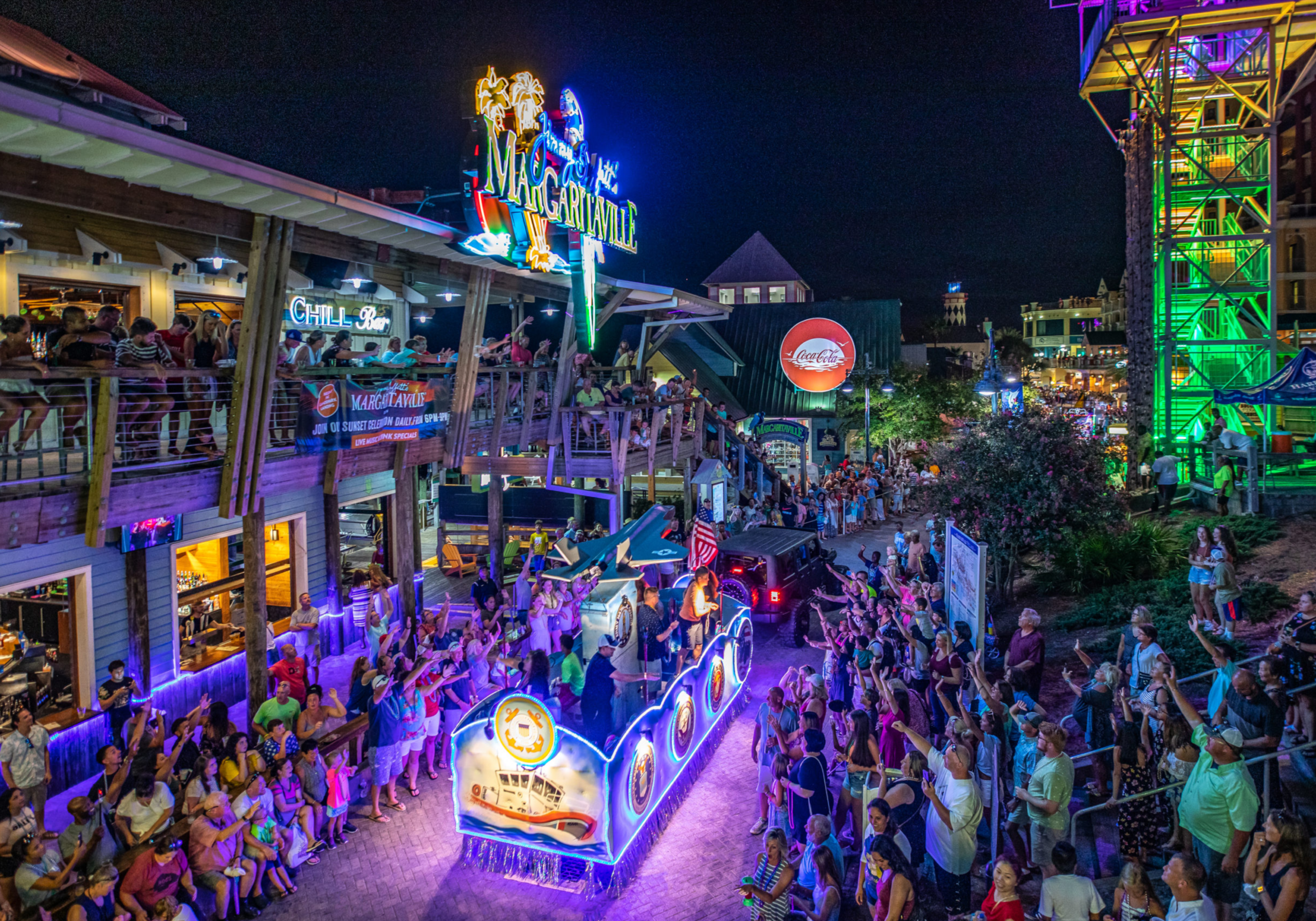 nightlife crowds and lights on the Destin Harbor Boardwalk in Destin Florida